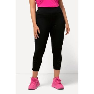 Damskie Sportowe legginsy 7/8 szybkoschnące z wycięciami wysoki stan. Czarne legginsy Ulla Popken, bez wzorów, z elastanu, z podwyższonym stanem. Za 244,99 zł.