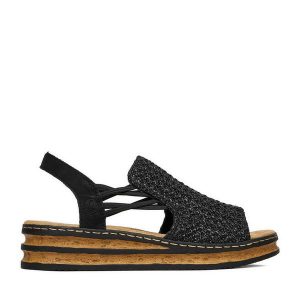 Sandały Rieker. Czarne sandały Rieker, bez wzorów, bez obcasa, na koturnie, bez zapięcia. Za 319,99 zł.