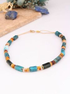 Charlize Pozłacany naszyjnik z kamieniami szlachetnymi - dł. 45 cm rozmiar: onesize. Brązowe naszyjniki Charlize, z turkusem, pozłacane. Za 82,83 zł.