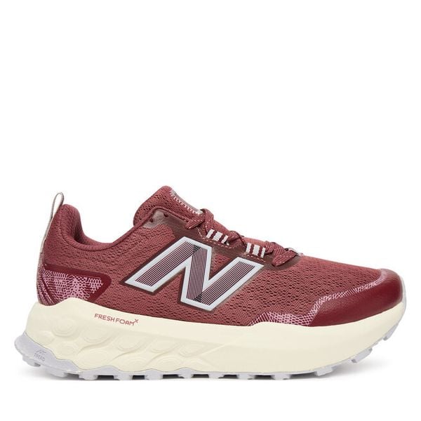 Buty do biegania New Balance. Czerwone buty sportowe New Balance, bez wzorów, bez zapięcia, do biegania. Za 409,99 zł.
