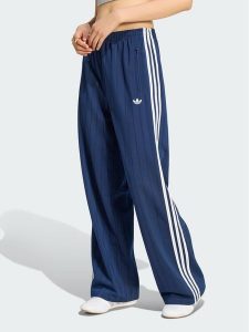 Adidas Spodnie dresowe 165468 Niebieski jasny Loose Fit. Niebieskie spodnie dresowe ADIDAS, s, bez wzorów, z dresówki. Za 299,99 zł.