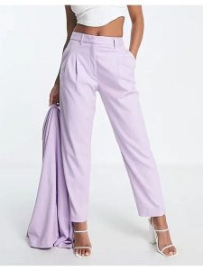 Monki Spodnie w kolorze lawendowym rozmiar: 34. Różowe spodnie z wysokim stanem Monki, bez wzorów, z materiału, z podwyższonym stanem. Za 43,99 zł.