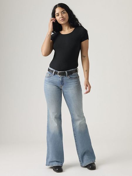 Levi's Dżinsy - Flared fit - w kolorze błękitnym rozmiar: W27/L32. Niebieskie jeansy Levi's®, z aplikacjami. Za 179,95 zł.