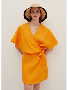 STEFANEL Sukienka w kolorze musztardowym rozmiar: 40. Pomarańczowe sukienki Stefanel, bez wzorów, ze lnu, bez kołnierzyka, bez ramiączek, mini, rozkloszowane. Za 304,99 zł.