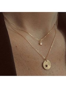 Les Favorites Pozłacany naszyjnik z elementami ozdobnymi - dł. 39 cm rozmiar: onesize. Żółte naszyjniki Les Favorites, pozłacane. Za 121,99 zł.