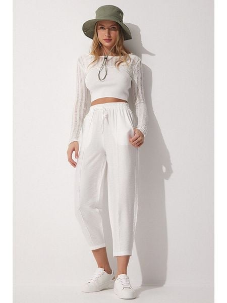 Hapiness Istanbul Lniane spodnie w kolorze białym rozmiar: 38. Białe spodnie z wysokim stanem Hapiness Istanbul, bez wzorów, ze lnu, z podwyższonym stanem. Za 78,47 zł.