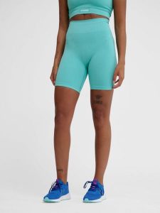 Damskie wysokie legginsy bezszwowe Hummel Alive. Niebieskie legginsy Hummel, bez wzorów, z materiału, z podwyższonym stanem. Za 172,50 zł.