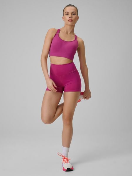 4F Legginsy krótkie treningowe damskie - różowe XL. Czerwone legginsy 4f, bez wzorów, z podwyższonym stanem, krótkie. Za 79,99 zł.