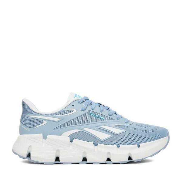 Buty do biegania Reebok. Niebieskie buty sportowe Reebok, bez wzorów, bez zapięcia, do biegania. Za 229,99 zł.