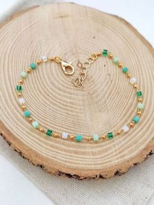 Atelier MIU Pozłacana bransoletka z kamieniami ozdobnymi rozmiar: onesize. Zielone bransoletki Atelier MIU, pozłacane. Za 69,91 zł.