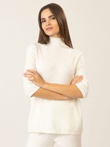 APART Wełniana koszulka w kolorze kremowym rozmiar: L. Brązowe bluzki Apart, l, bez wzorów, z wełny, bez kołnierzyka, bez ramiączek. Za 233,33 zł.