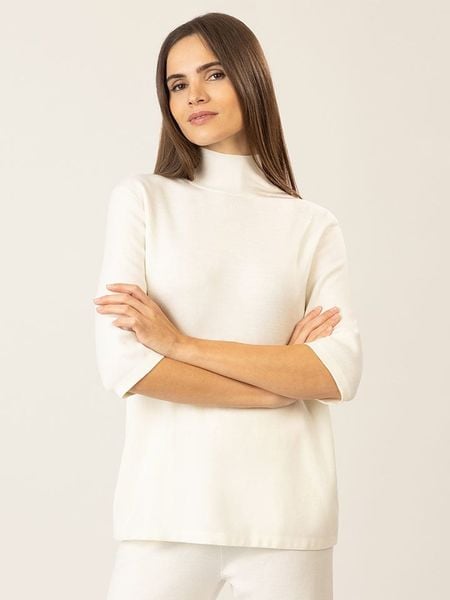 APART Wełniana koszulka w kolorze kremowym rozmiar: L. Brązowe bluzki Apart, l, bez wzorów, z wełny, bez kołnierzyka, bez ramiączek. Za 233,33 zł.