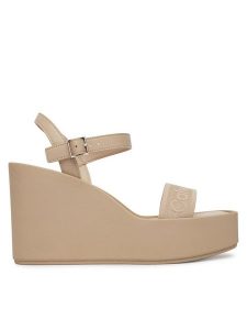 Calvin Klein Sandały Wedge 70 Sndl Webbing Lth HW0HW02882 Beżowy. Brązowe sandały Calvin Klein, bez wzorów, z materiału, bez obcasa, na koturnie, bez zapięcia. Za 449,99 zł.