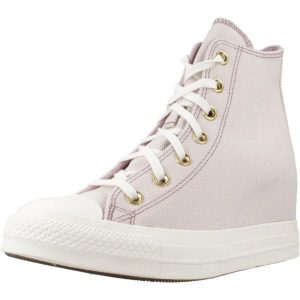 Buty CONVERSE CHUCK TAYLOR ALL STAR WEDGE Fioletowy. Fioletowe trampki Converse, bez wzorów, z tkaniny, bez zapięcia. Za 387,99 zł.