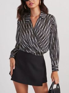 Milan Kiss Bluzka w kolorze czarno-białym rozmiar: XL. Czarne bluzki Milan Kiss, xl, bez wzorów, bez kołnierzyka, bez ramiączek. Za 126,99 zł.