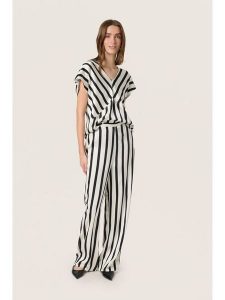 Soaked in Luxury Spodnie w kolorze biało-czarnym rozmiar: L. Białe spodnie z wysokim stanem Soaked in Luxury, bez wzorów, z materiału, z podwyższonym stanem. Za 165,99 zł.