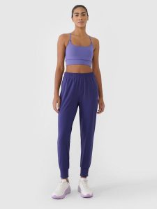 4F Spodnie treningowe szybkoschnące damskie - granatowe XS. Niebieskie spodnie sportowe 4f, s, bez wzorów, z dzianiny, na fitness i siłownię. W wyprzedaży za 129,99 zł.