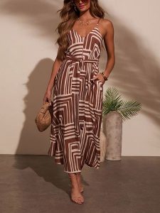 Milan Kiss Sukienka w kolorze brązowo-beżowym rozmiar: XL. Brązowe sukienki Milan Kiss, na imprezę, xl, bez wzorów, z tkaniny, bez kołnierzyka, bez ramiączek, maxi. Za 226,45 zł.