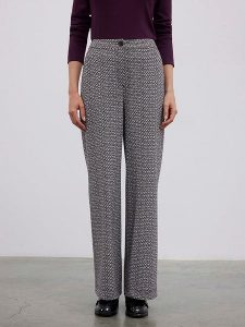 BGN Spodnie w kolorze czarno-białym rozmiar: 38. Czarne spodnie z wysokim stanem BGN, bez wzorów, z materiału, z podwyższonym stanem. Za 131,12 zł.