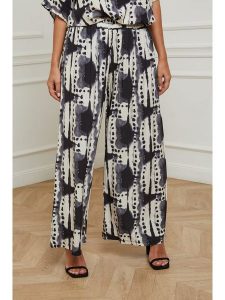 Plus Size Company Spodnie w kolorze kremowo-czarnym rozmiar: 50. Brązowe spodnie z wysokim stanem Plus Size Company, bez wzorów, z materiału, z podwyższonym stanem. Za 96,60 zł.