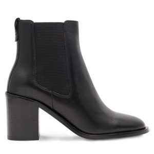 Botki GINO ROSSI. Czarne botki Gino Rossi, bez wzorów, bez obcasa, na słupku, bez zapięcia. Za 399,99 zł.