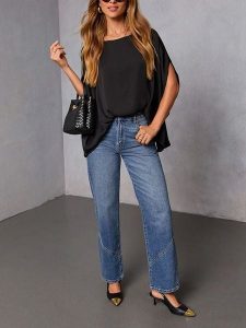 Milan Kiss Bluzka w kolorze czarnym rozmiar: M. Czarne bluzki Milan Kiss, m, bez wzorów, bez kołnierzyka, bez ramiączek. Za 126,99 zł.