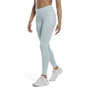 Legginsy damskie Reebok Lux. Niebieskie legginsy Reebok, bez wzorów. W wyprzedaży za 191,45 zł.