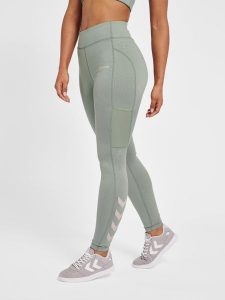 Damskie legginsy mid-rise Hummel MT Chipo. Zielone legginsy Hummel, bez wzorów, z elastanu. Za 157,55 zł.
