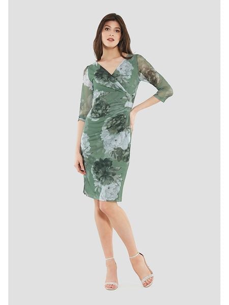 SWING Sukienka w kolorze zielonym rozmiar: 38. Zielone sukienki Swing, bez wzorów, bez kołnierzyka, bez ramiączek, mini. Za 210,32 zł.