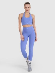4F Legginsy treningowe szybkoschnące 4F x Anna Lewandowska - niebieskie M. Niebieskie legginsy 4f, bez wzorów, z dzianiny, z podwyższonym stanem. Za 129,99 zł.