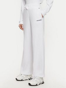 Tommy Hilfiger Spodnie dresowe UW0UW05577 Biały Relaxed Fit. Białe spodnie dresowe TOMMY HILFIGER, xs, bez wzorów, z bawełny. Za 159,99 zł.