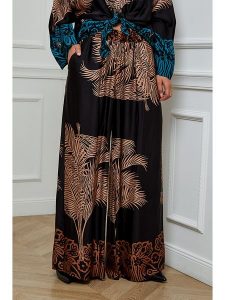 L'armoire de Suzette Spodnie w kolorze czarno-brązowym rozmiar: 34/36. Czarne spodnie z wysokim stanem L'armoire de Suzette, bez wzorów, z materiału, z podwyższonym stanem. Za 132,93 zł.