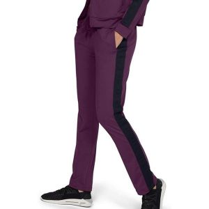 Spodnie treningowe damskie Under Armour Mujer sportowe fioletowe. Fioletowe spodnie dresowe Under Armour, bez wzorów, z elastanu. Za 260,70 zł.