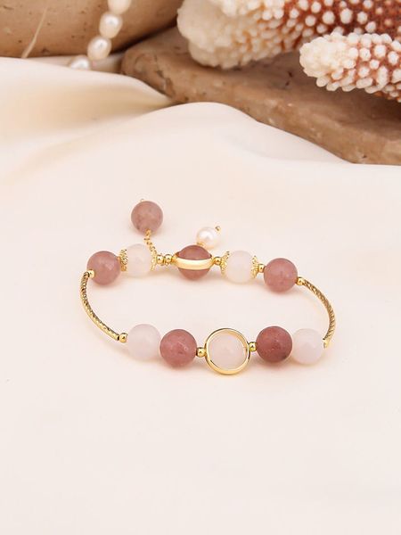 Pierres de Jade Pozłacana bransoletka z perłami i kwarcem rozmiar: onesize. Brązowe bransoletki Pierres de Jade, z kwarcem, pozłacane. Za 39,99 zł.