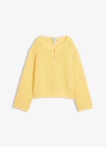 Sweter ażurowy oversize, o kroju pudełkowym. Żółte swetry klasyczne bonprix, z bawełny, bez kołnierzyka. Za 112,99 zł.