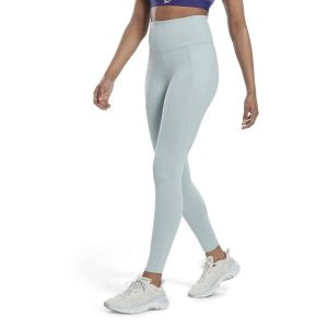 Damskie legginsy z wysokim stanem Reebok Lux. Niebieskie legginsy Reebok, bez wzorów, z podwyższonym stanem. W wyprzedaży za 208,60 zł.