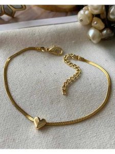 Luseera Pozłacana bransoletka z elementem ozdobnym rozmiar: onesize. Żółte bransoletki Luseera, pozłacane. Za 34,99 zł.