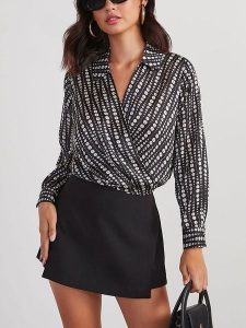 Milan Kiss Bluzka w kolorze czarnym rozmiar: S. Czarne bluzki Milan Kiss, s, bez wzorów, bez kołnierzyka, bez ramiączek. Za 130,99 zł.