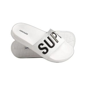 Klapki damskie Superdry Core. Białe klapki Superdry, bez wzorów, z materiału, bez obcasa. Za 160,00 zł.