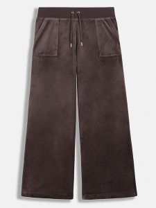 Juicy Couture Spodnie dresowe w kolorze brązowym rozmiar: M. Brązowe spodnie dresowe Juicy Couture, m, bez wzorów, z dresówki. Za 171,68 zł.