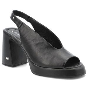 Czarne Sandały Karino Eleganckie Obuwie Damskie. Czarne sandały Karino, bez wzorów, ze skóry, z otwartym noskiem, bez obcasa, na obcasie, bez zapięcia. Za 439,00 zł.