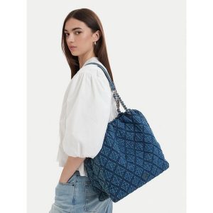 Torebka Tommy Hilfiger. Niebieskie torebki klasyczne TOMMY HILFIGER, bez wzorów, z denimu, bez dodatków. Za 640,99 zł.