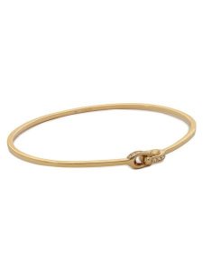 Coach Bransoletka Interlock Pave C Bangle Bracelet 37440615GLD710 Złoty. Żółte bransoletki Coach, metalowe. Za 349,99 zł.