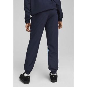Młodzieżowe spodnie Manchester City ftblARCHIVE PUMA Navy Team Light Blue. Niebieskia spodnie dresowe Puma, m, bez wzorów, z dresówki. W wyprzedaży za 189,00 zł.