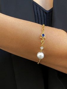 DI GIORGIO Pozłacana bransoletka z cyrkoniami i perłą rozmiar: onesize. Białe bransoletki DI GIORGIO, z cyrkonią, pozłacane. Za 150,95 zł.