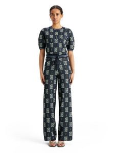 Scotch & Soda Spodnie w kolorze granatowym rozmiar: S. Niebieskie spodnie z wysokim stanem Scotch & Soda, bez wzorów, z materiału, z podwyższonym stanem. Za 180,06 zł.