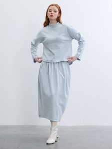 BGN Koszulka w kolorze błękitnym rozmiar: 38. Niebieskie bluzki BGN, bez wzorów, bez kołnierzyka, bez ramiączek. Za 100,99 zł.