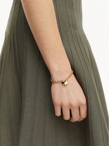 Guess Bransoletka JUBB05 217JW Złoty. Żółte bransoletki Guess, metalowe. Za 229,99 zł.