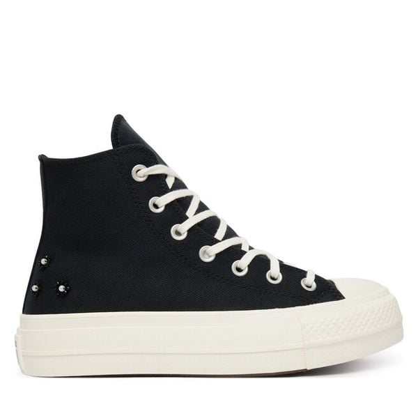 Trampki Converse. Czarne trampki Converse, bez wzorów, bez zapięcia. Za 449,99 zł.