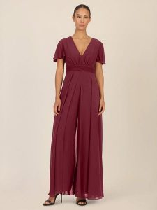 APART Kombinezon w kolorze bordowym rozmiar: 34. Czerwone kombinezony Apart, bez wzorów, bez kołnierzyka, bez ramiączek. Za 295,99 zł.